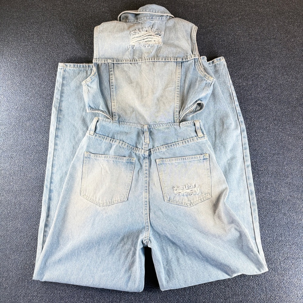 Fashion Nova Light Wash Denim Cutout Jumpsuit - Picture 5 of 8
